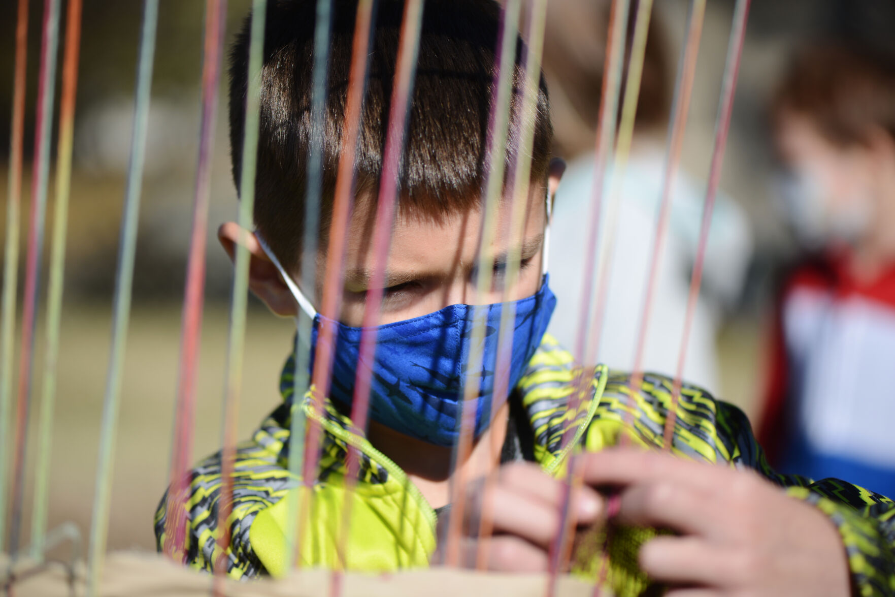 John Patchett weaves a piece of fabric